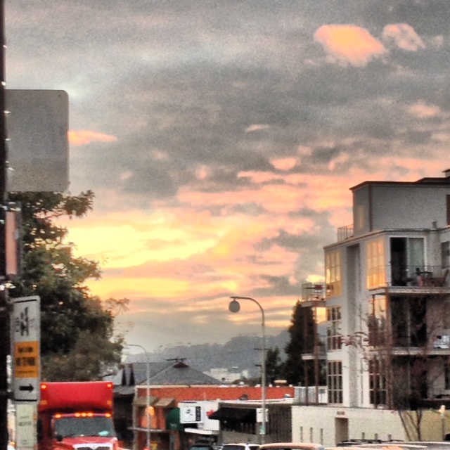 I noticed this sunset while paying my parking meter. While I was clicking pics of it my husband call to tell me to look get to where I could see the sunset. 