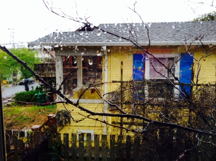 Neighbors  Yellw Hous in the rain