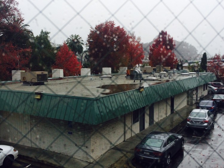 Rain on the roof though wet window