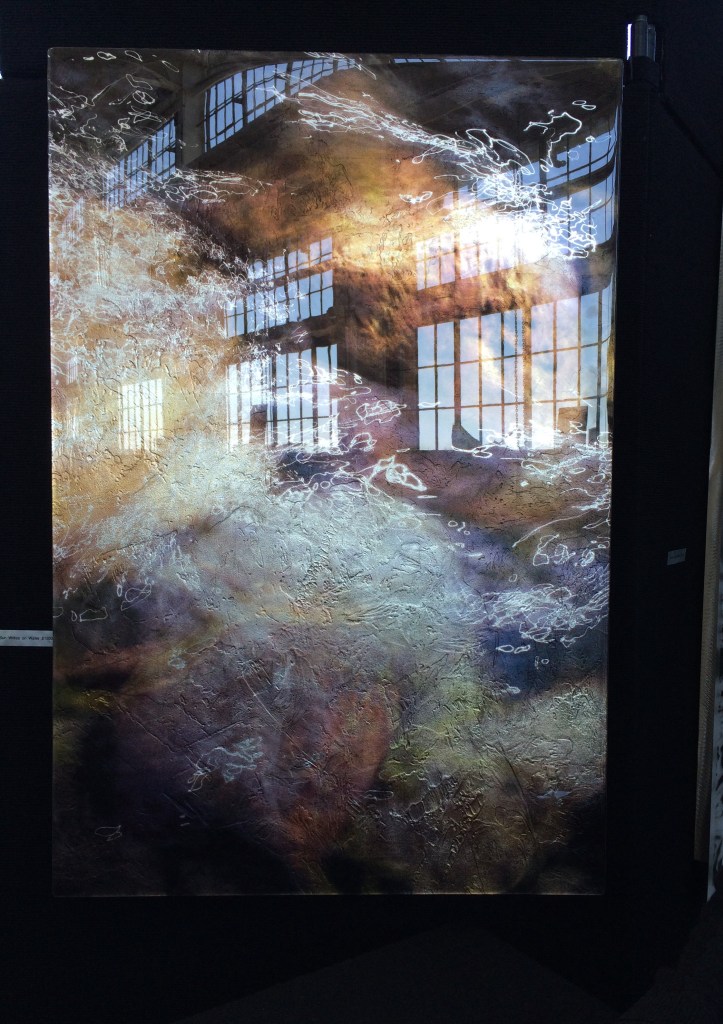 The windows of Crain Way Pavilion reflected