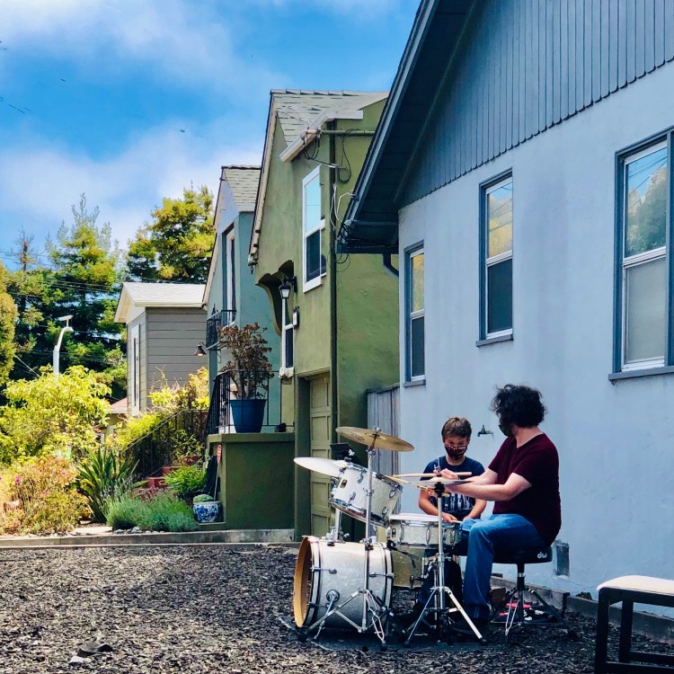 Boys playing drum set